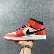 Jordan Air Jordan 1 Mid GS Sneakers in Pink and Orange