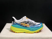 HOKA Stinson 7 Trail Sneakers in Blue and Lime
