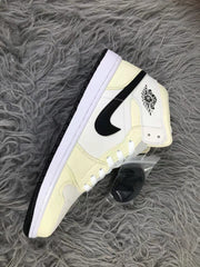 Jordan Air 1 Mid Sneakers Cream White and Black