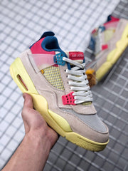Union x Air Jordan 4 Sneakers Pink Beige Navy Yellow