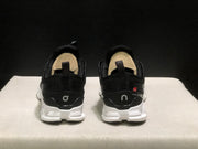 On Cloud X Z5 Sneakers in Black and White