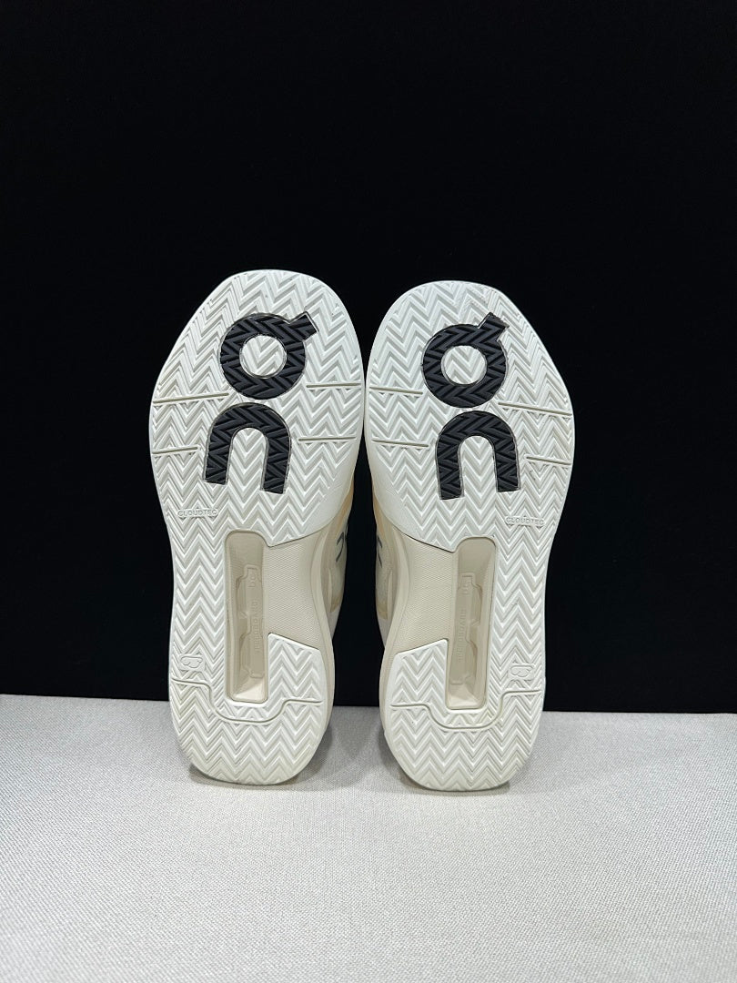 On The Roger Advantage Pro Sneakers in Cream and Black