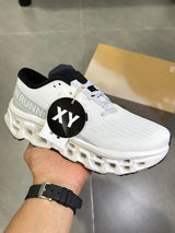On Running White and Black Running Shoes