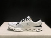 On Cloud X 4 Ivory and Black Sneakers