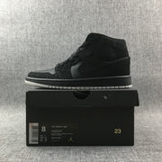 Jordan Air Jordan 1 Mid Black and White Sneakers 554724-001