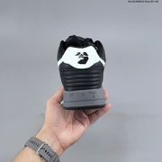 Off-White Arrows Low-Top Sneakers in Black and White