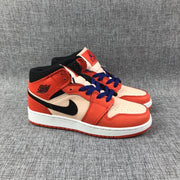 Jordan Air Jordan 1 Mid GS Sneakers in Pink and Orange