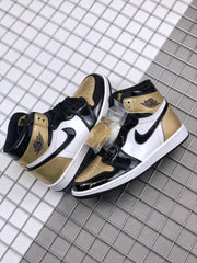 Air Jordan 1 High Gold Toe Black and Gold Sneakers