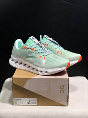 On Cloudsurfer Sneakers in Pale Green and White