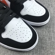 Air Jordan 1 Mid Black White Orange Sneakers 554724-058