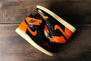 Air Jordan 1 Retro High OG Black and Orange Sneakers
