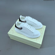 Alexander McQueen Oversized Low-Top Sneakers with Crystal Heel