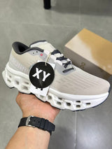 On Running Cloudmonster Sneakers in Gray and White