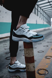 Air Jordan 11 Iridescent Sneakers in White and Black