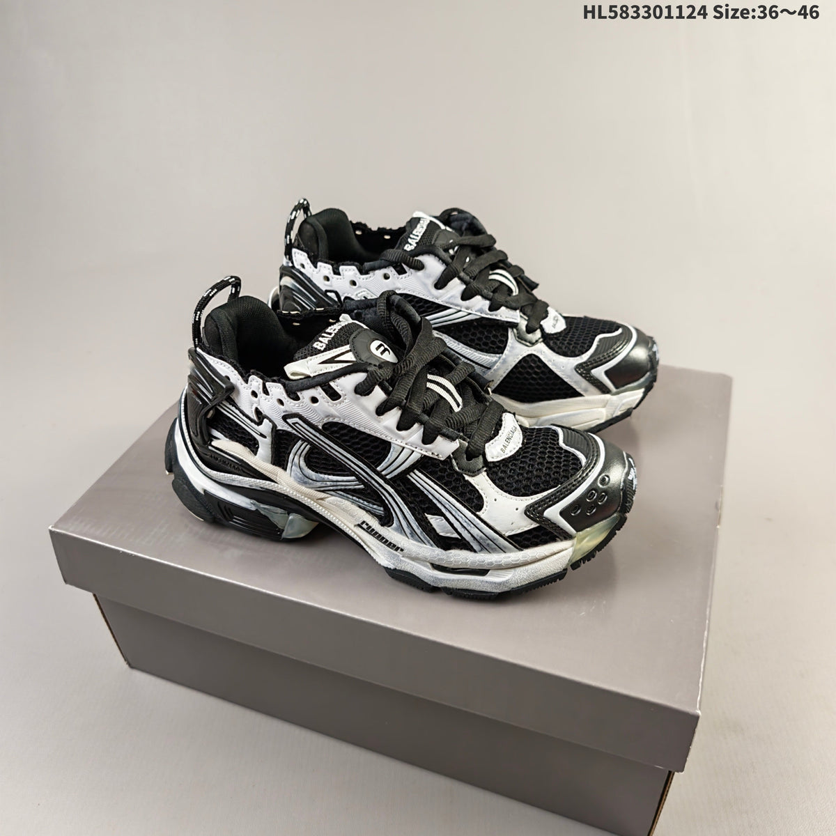 Balenciaga Runner Low-Top Sneakers in Black and White