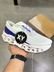 On Running Sneakers in White and Purple