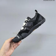 New Balance MT10O6NW Low-Profile Sneakers in Black