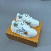 Louis Vuitton Studded Low-Top Sneakers in White and Black