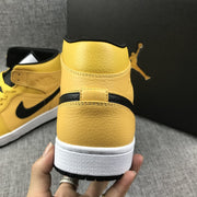 Air Jordan 1 Mid Yellow Ochre Black Sneakers 554724-700