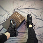 Air Jordan 11 Cap and Gown Black High-Top Sneakers
