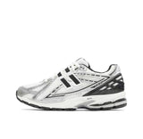 New Balance M1906RER Sneakers in White and Black