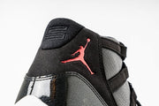 Air Jordan 11 Retro 72-10 Black and White High-Top Sneakers