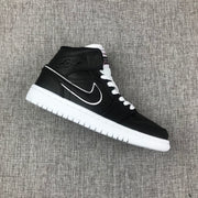 Air Jordan 1 Mid Black and White Sneakers 852542-016