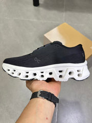 On Running Black and White Road Running Sneakers