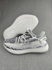 Yeezy 350 V2 Knit Sneakers in Black and White