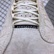 Air Jordan 13 CNY Sneakers in White, Gold and Pink