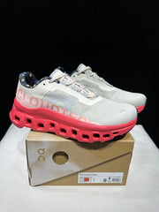 On Cloudmonster Sneakers in Light Gray and Coral