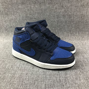 Air Jordan 1 Mid Black and Royal Blue High-Top Sneakers