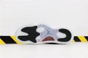 Air Jordan 11 Retro 72-10 Black and White High-Top Sneakers