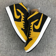 Air Jordan 1 Mid Black and Yellow Sneakers