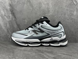New Balance Silver and Black Sneakers