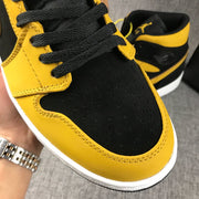 Air Jordan 1 Mid Black and Yellow Sneakers