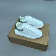 Alexander McQueen Oversized Low-Top Sneakers with Crystal Heel