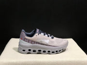 On Cloudmonster Sneakers in Gray and Purple
