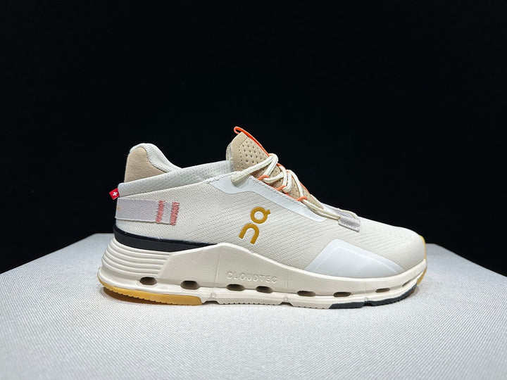 On Cloudnova 2 Sneakers in Ivory and Orange