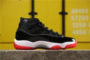 Air Jordan 11 Retro Bred Black and Red High-Top Sneakers