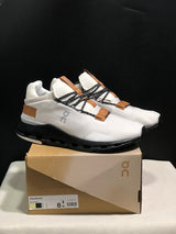 On Cloudnova Sneakers in White, Black and Tan