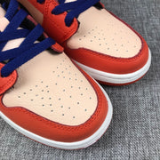 Jordan Air Jordan 1 Mid GS Sneakers in Pink and Orange