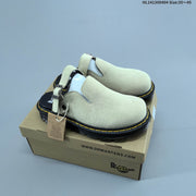 Dr. Martens Buckle-Strap Mule Clogs in Black and Sage