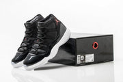Air Jordan 11 Retro 72-10 Black and White High-Top Sneakers