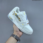 Louis Vuitton Low-Top Sneakers in White with Floral or Black Trim