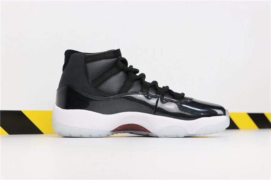 Air Jordan 11 Retro 72-10 Black and White High-Top Sneakers