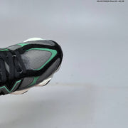 New Balance 9060 Sneakers in Charcoal and Green