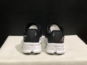 On Cloudmonster Black and White Running Sneakers