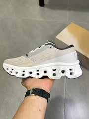 On Running Cloudmonster Sneakers in Gray and White