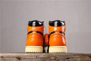 Air Jordan 1 Retro High OG Black and Orange Sneakers
